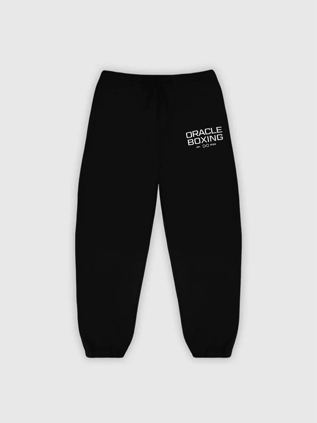 Black sweatpants with 'Oracle Boxing' logo on a light gray background